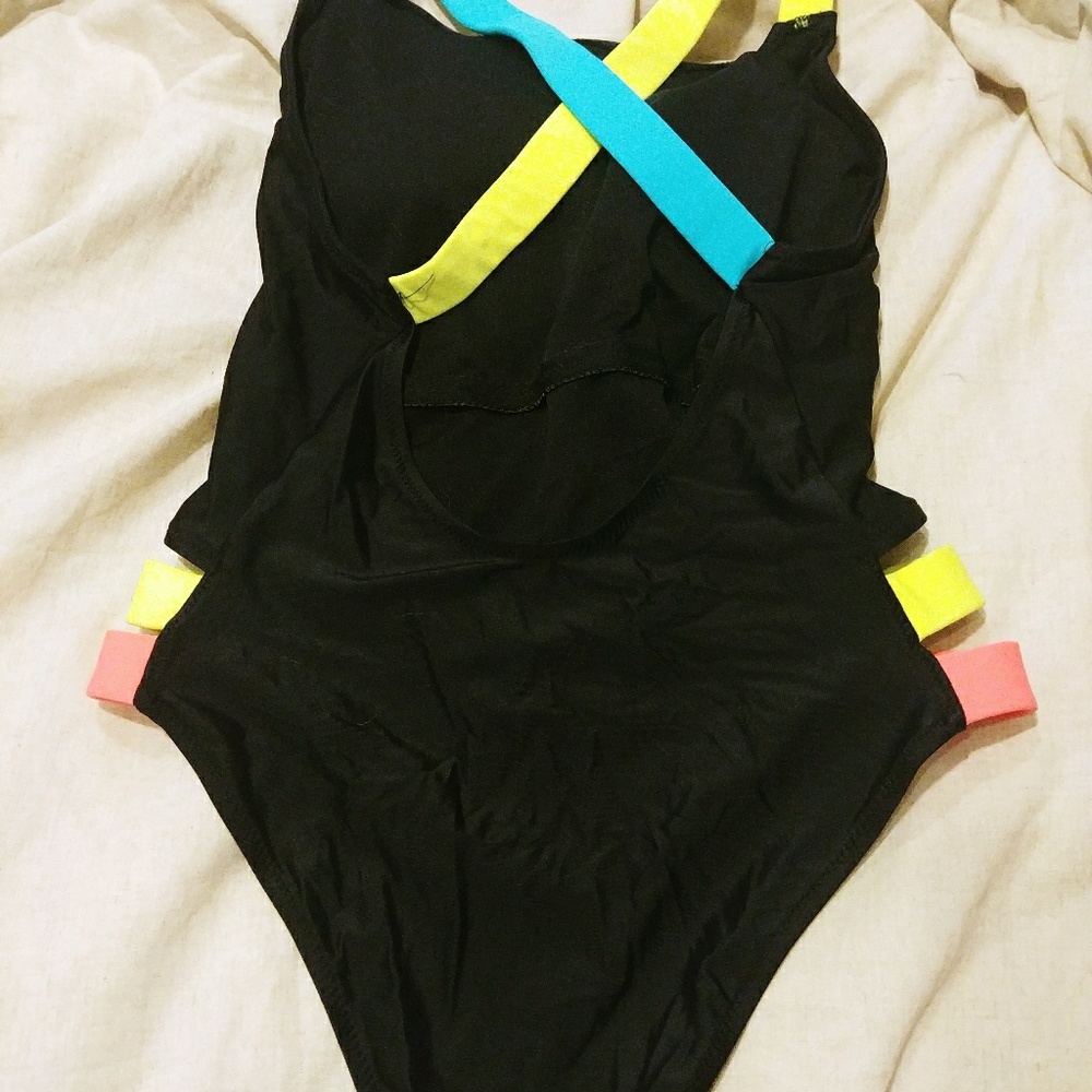 Black one peice with accent straps